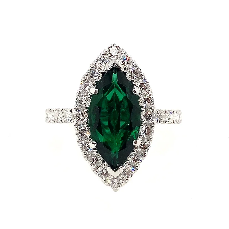 White Gold Emerald and Diamond Halo Ring